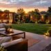 Cozy backyard patio with stone pavers, outdoor chairs, and potted plants after a simple yard makeover